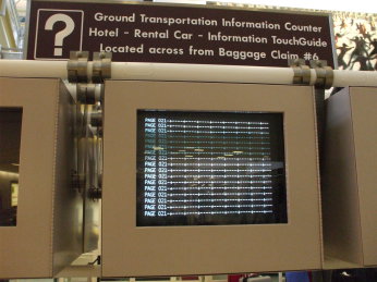 Epic fail: Crash dump screen at baggage claim, Washington National airport terminal.