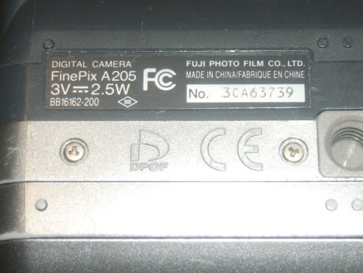Close up of Fuji FinePix A205 camera and its Y slotted screws.