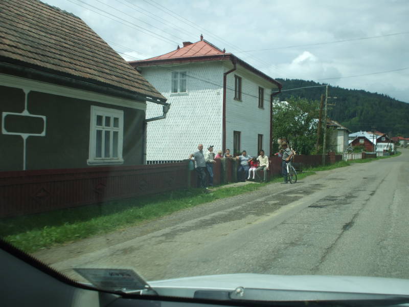People gathered beside a highway in northern Romania.