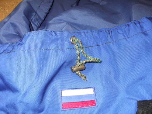 Drawstring and Russian flag on a backpack.