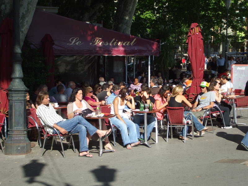 Young people at cafes around La Rotonde at the end of Cours Mirabeau in Aix-en-Provence.