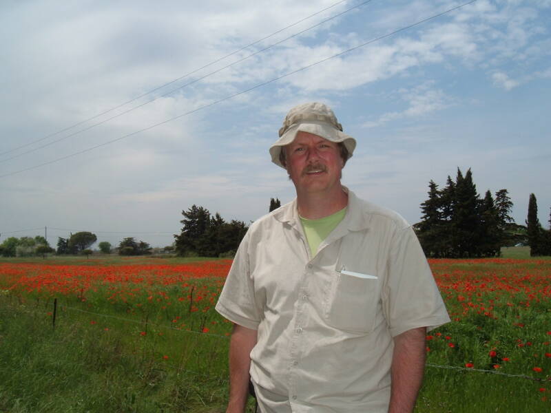 Bob Cromwell at a field of red poppies at Port Cassafières.