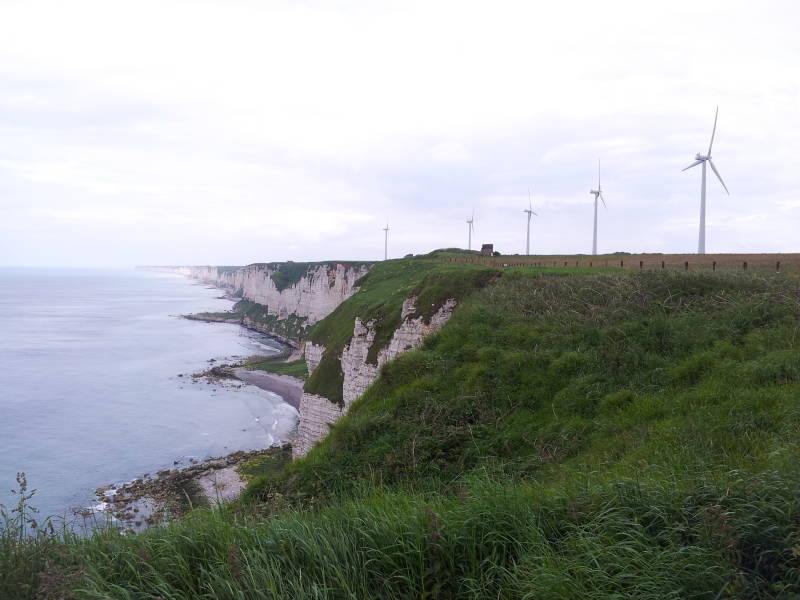 Electrical generating wind turbines on the cliffs of Cap Fagnet above Fécamp on the Normandy coast.