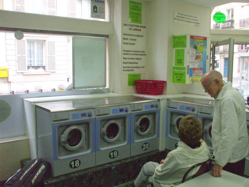 Waiting patiently in the Lavomat in Paris, France.