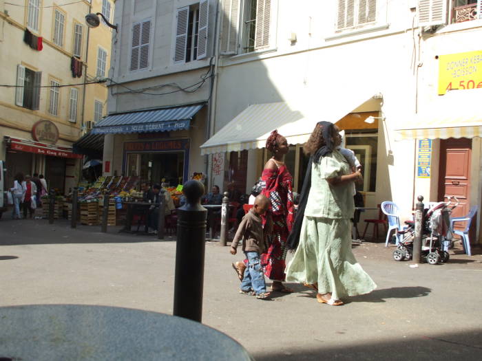 Watching the crowds pass while seated at le Grand Bar Vacon in the market district of Marseille.