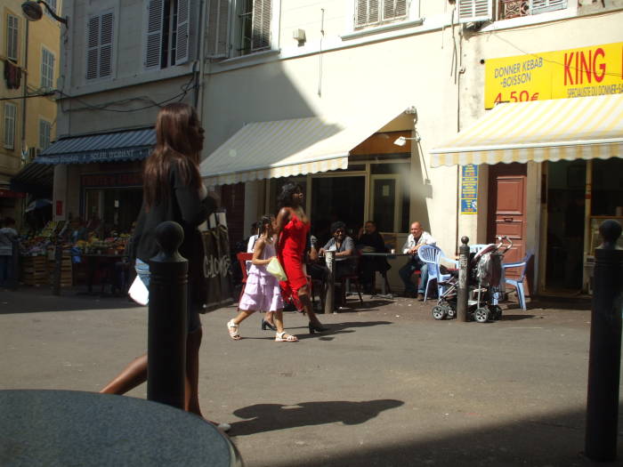 Watching the crowds pass while seated at le Grand Bar Vacon in the market district of Marseille.