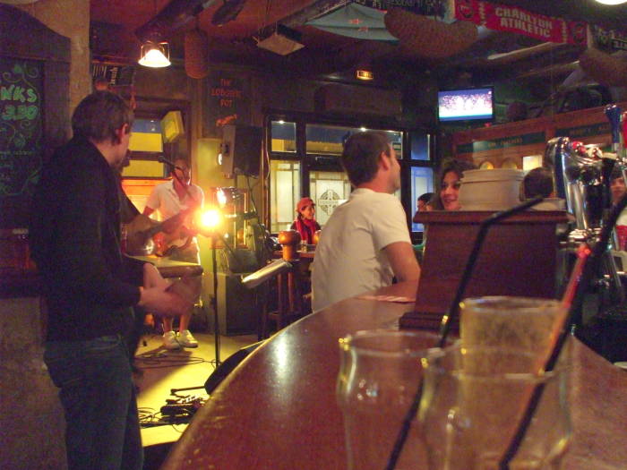 Band performing in a bar along the waterfront of Vieux Port, the Old Port of Marseille.