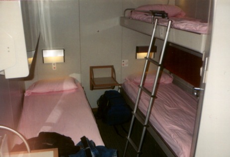 Two people share a 4-berth cabin in Brittany Ferries ship crossing the English Channel from Portsmouth in England to Saint Malo in France.