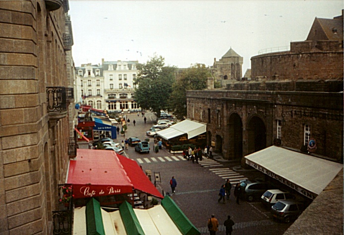 I walk along the walls of the old city in Saint Malo, France.