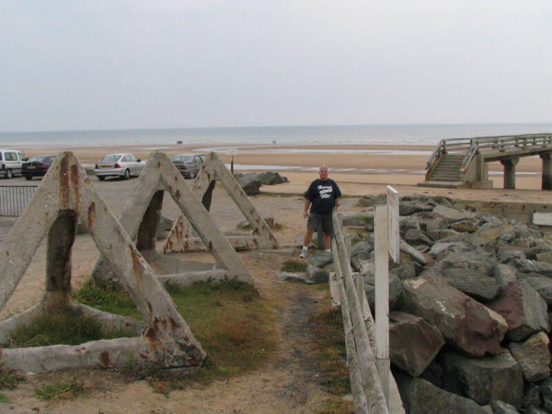 Pyramidal concrete and steel obstructions at Omaha Beach.