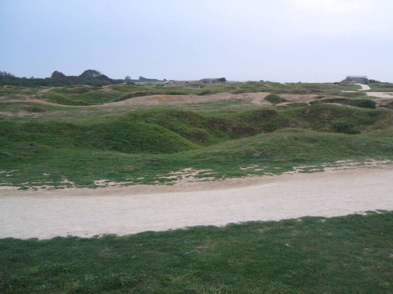 Shell craters and ruins at Pointe du Hoc.