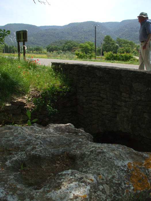 View of the nearby hills from the Dolmen de la Pitchoune, megalithic dolmen structure near the village of Ménerbes, in Provence.