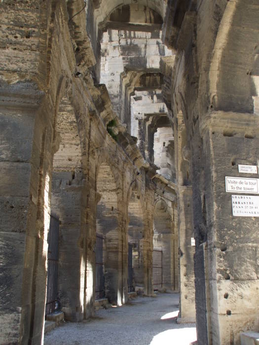 The seats and arena of the amphitheatre in Arles.