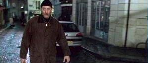 Vincent (Jean Reno) walks up Rue Drevet crossing Rue des 3 Frères and approaching the café Blue Sky.