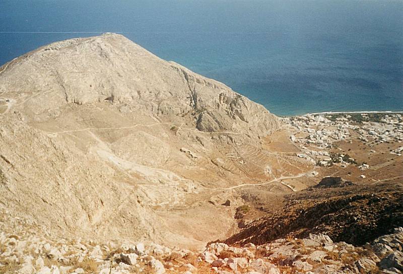 View across Moni Profiti Ilia summit and down to Perissa and its beach.