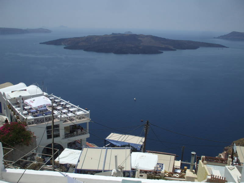 Νεα Καμενι or Nea Kameni, the small volcanic island in the center of the Santorini caldera.