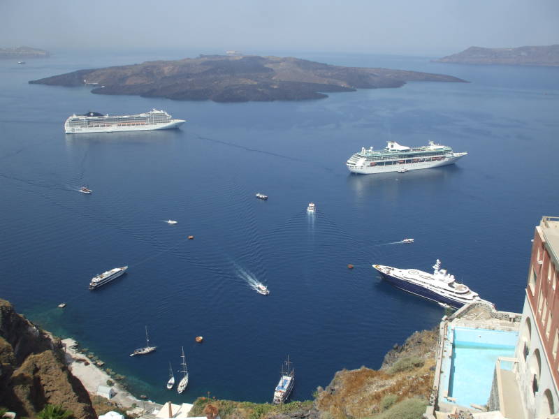 Several large cruise ships in the Santorini caldera.