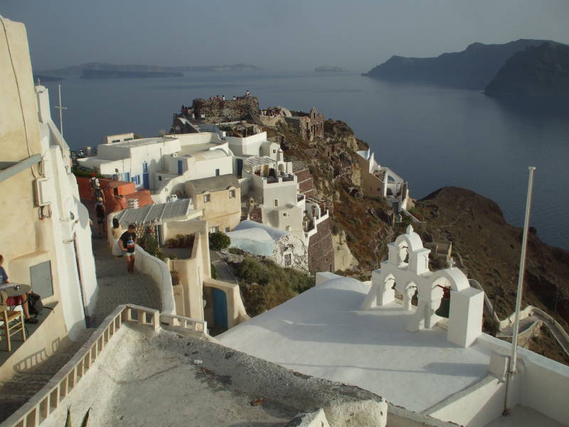 Watching the sunset in Oia, a small town on the Greek island of Santorini.