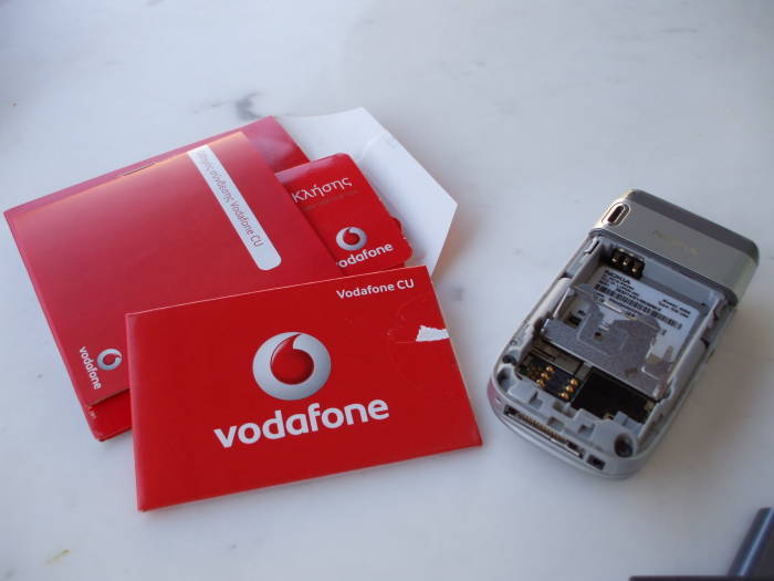 Vodaphone SIM card pack and Nokia GSM handset.