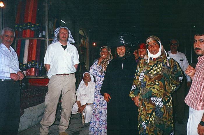 In the silk traders' bazaar in Aleppo, Syria. Local women with tattooed faces.