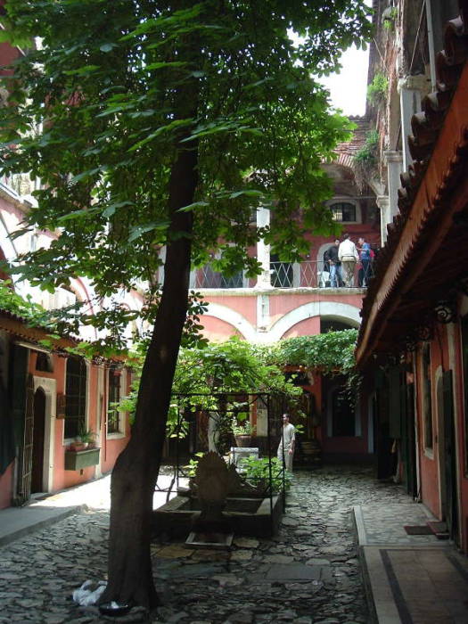 Zincirli Han within the Grand Bazaar in Istanbul. Shops and offices around a small courtyard, balconies above. According to 'From Russia With Love', a KGB office was up on that balcony.