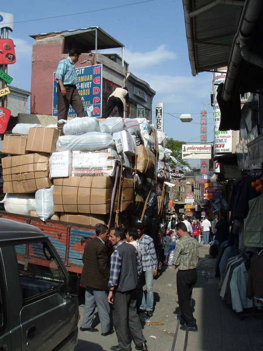 Uzuncarsi Caddesi (Longmarket Street) near the Grand Bazaar in Istanbul.  Shops selling manniquins, prayer beads, hookahs, luggage, hunting gear, and much more.