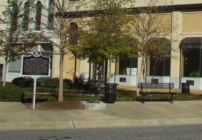 Rosa Parks' bus stop next to the Venetian style ironfront Central Bank Building in Montgomery, Alabama.