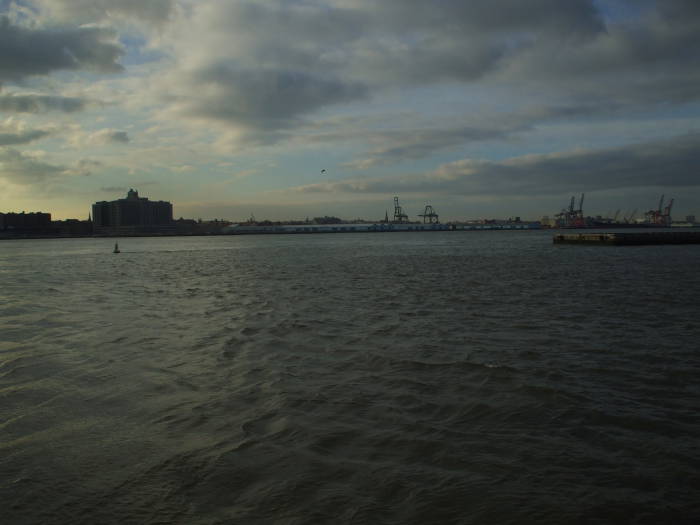 View across East River to Brooklyn waterfront, looking over the end of the Downtown Manhattan Heliport.