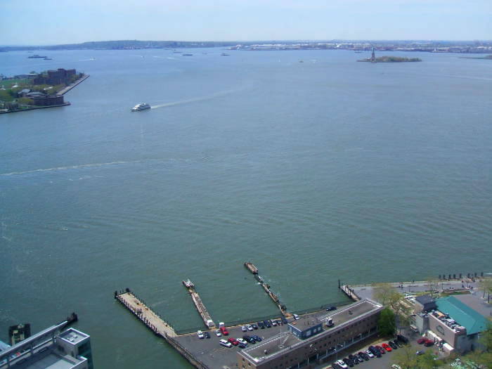 View over New York Harbor: The Battery, Governor's Island, Staten Island, Statue of Liberty, Port Newark-Elizabeth Marine Terminal.