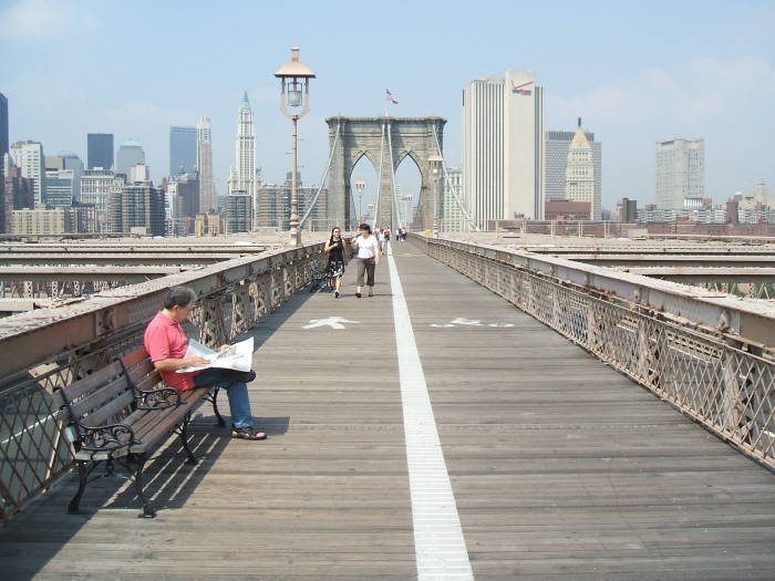 The tall building at 375 Pearl Street is directly ahead as we walk across the Brooklyn Bridge toward Manhattan.