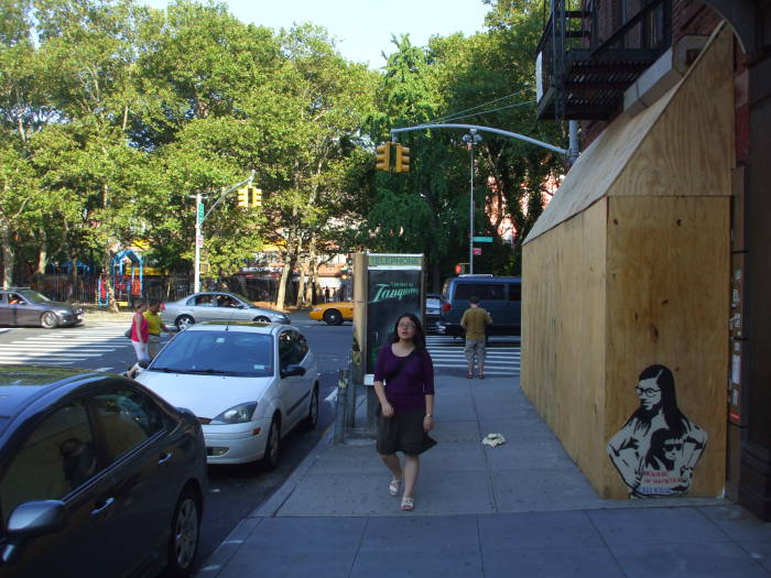 Hipster girl walking past stencil art of a hipster girl wearing a T-shirt bearing stencil art. BEWARE OF HIPSTERS!