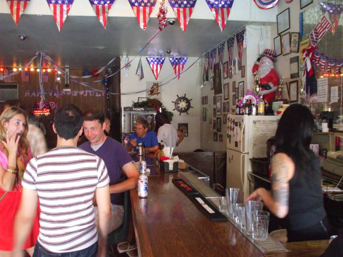Talking skate news with the punks in Johnson's Bar on Rivington Street.