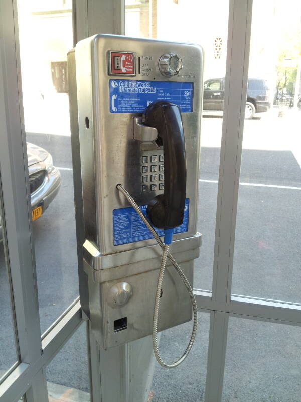 'Superman-style' full-height phone booth, one of the last 4 in Manhattan, at West End Avenue and 100th Street.