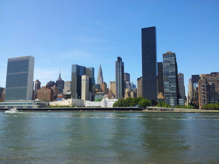 United Nations Headquarters, Empire State Building, and Chrysler Building in Manhattan as seen from Roosevelt Island in the East River in New York.