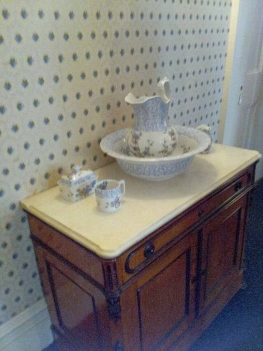 Water basin and pitcher in the master bedroom within Theodore Roosevelt's birthplace in New York.