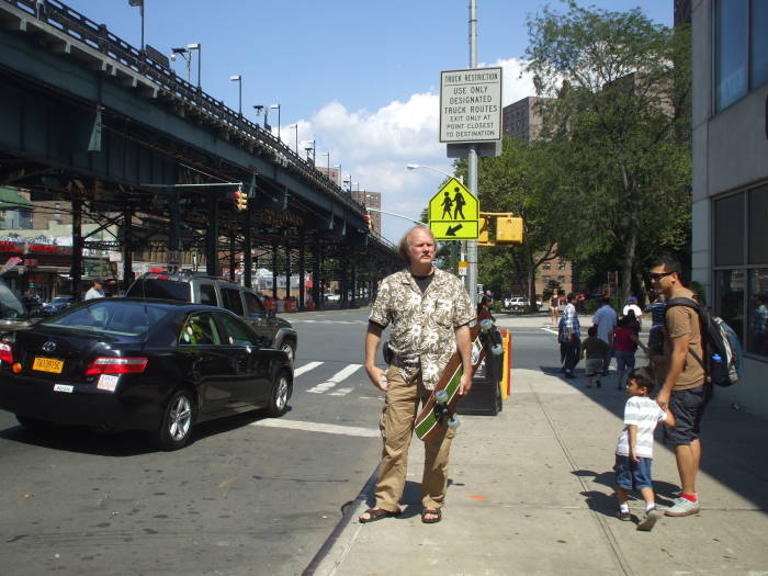 Preparing to ride a longboard the length of Manhattan.