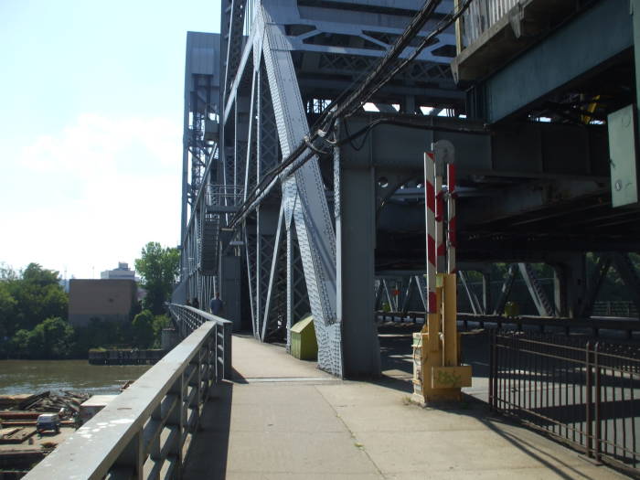 Crossing the Broadway Bridge on a longboard from the Bronx to the northern tip of Manhattan.