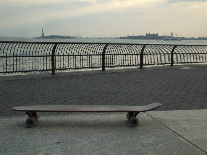 At the end!  At the Battery, Statue of Liberty and Ellis Island, Port of New Jersey in the background.