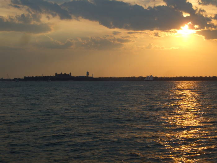 At the end! At the Battery, Statue of Liberty and Ellis Island, Port of New Jersey in the background.