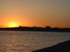 Sunset on the Bosphorus at Istanbul, with the Ayasofya (Haghia Sophia) and Blue Mosque in the Sultanahmet district.